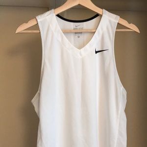 Athletic tank top by Nike. Size M. Bundle to save!